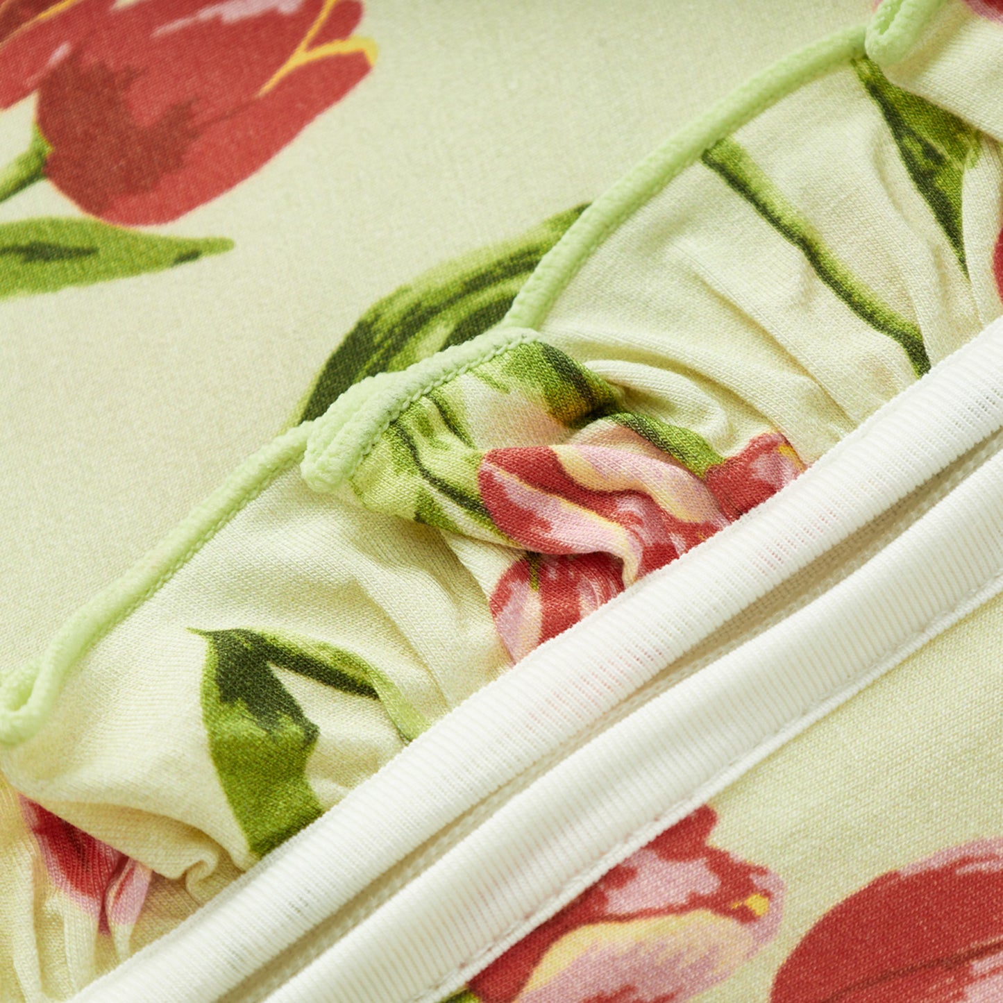 Tulip Luxe Stretch Ruffle Footed Romper