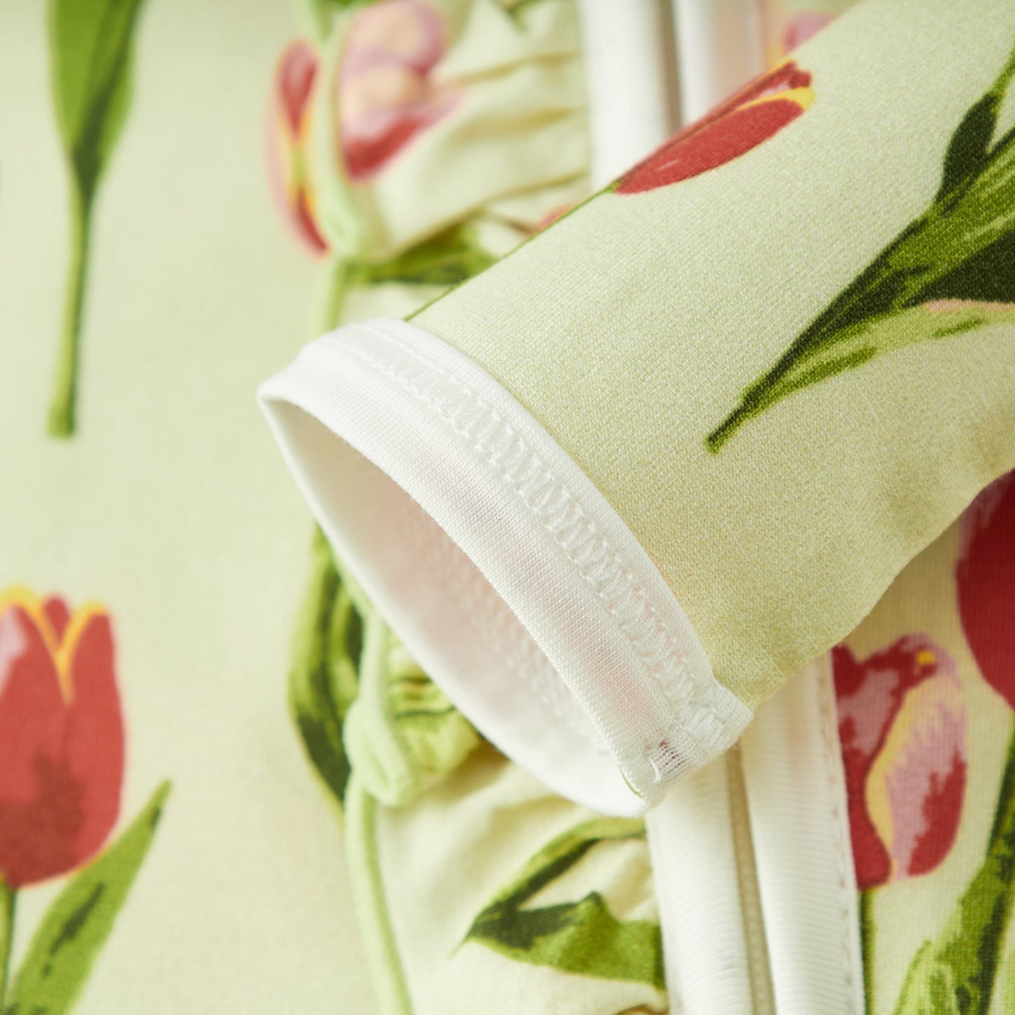 Tulip Luxe Stretch Ruffle Footed Romper