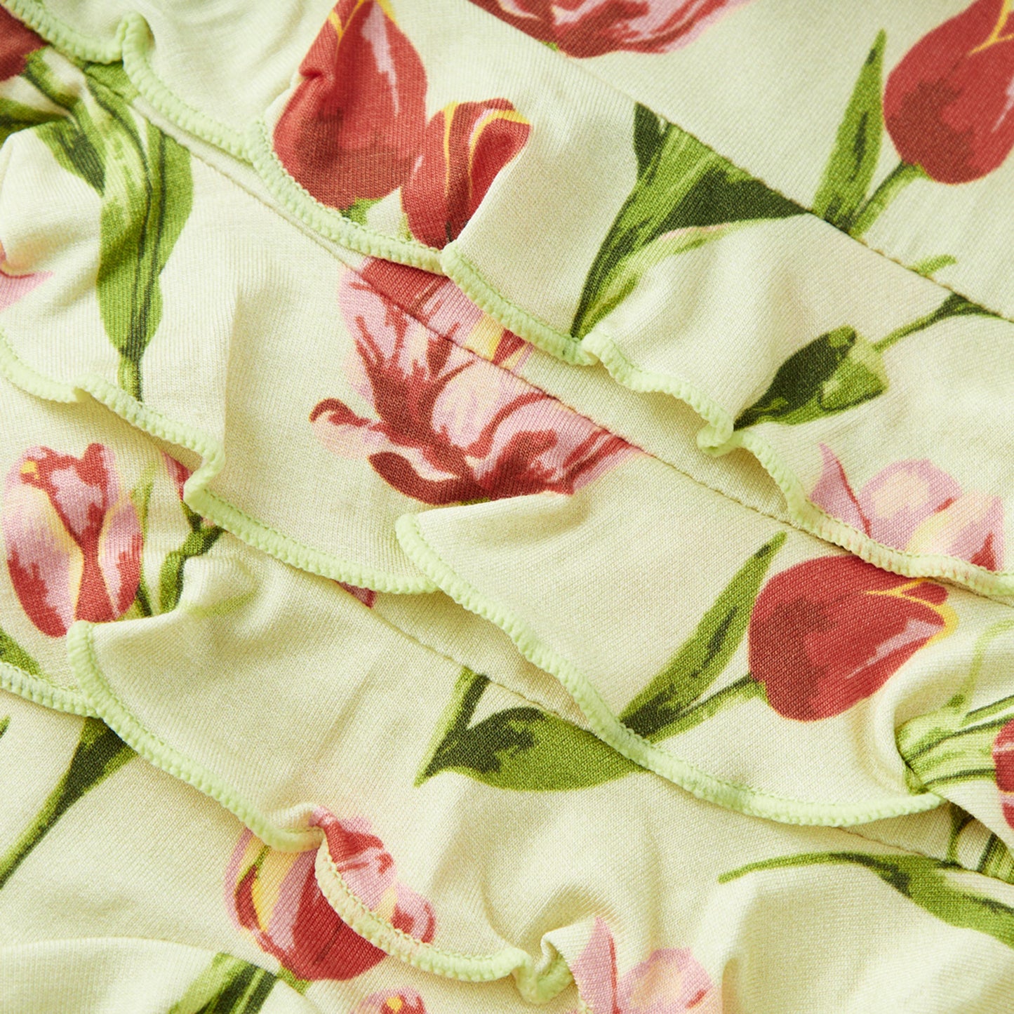 Tulip Luxe Stretch Ruffle Footed Romper