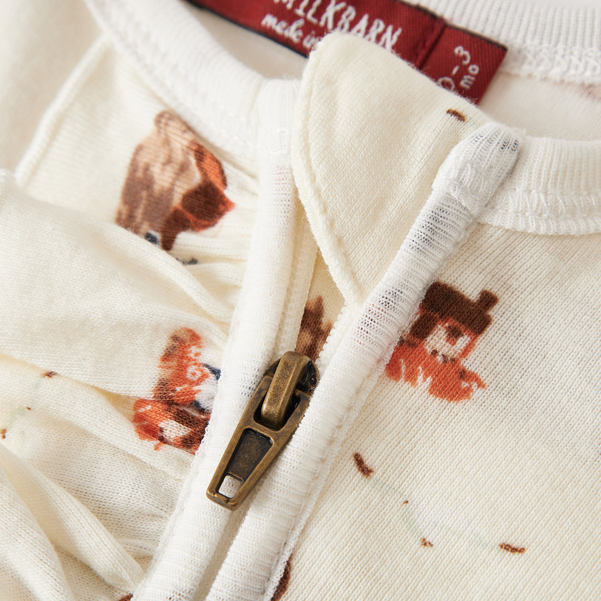 Sandcastle Organic Cotton Ruffle Zipper Footed Romper