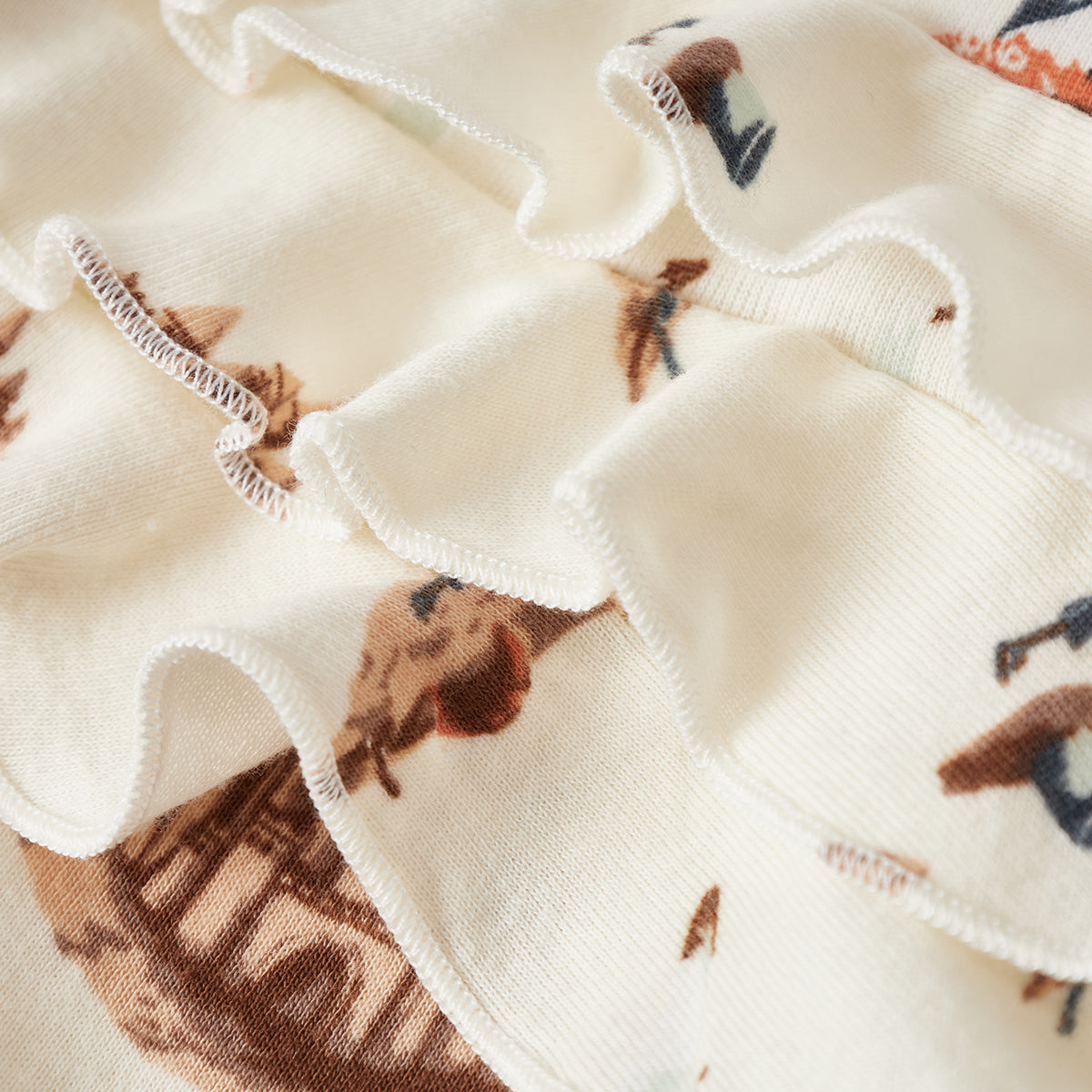 Sandcastle Organic Cotton Ruffle Zipper Footed Romper