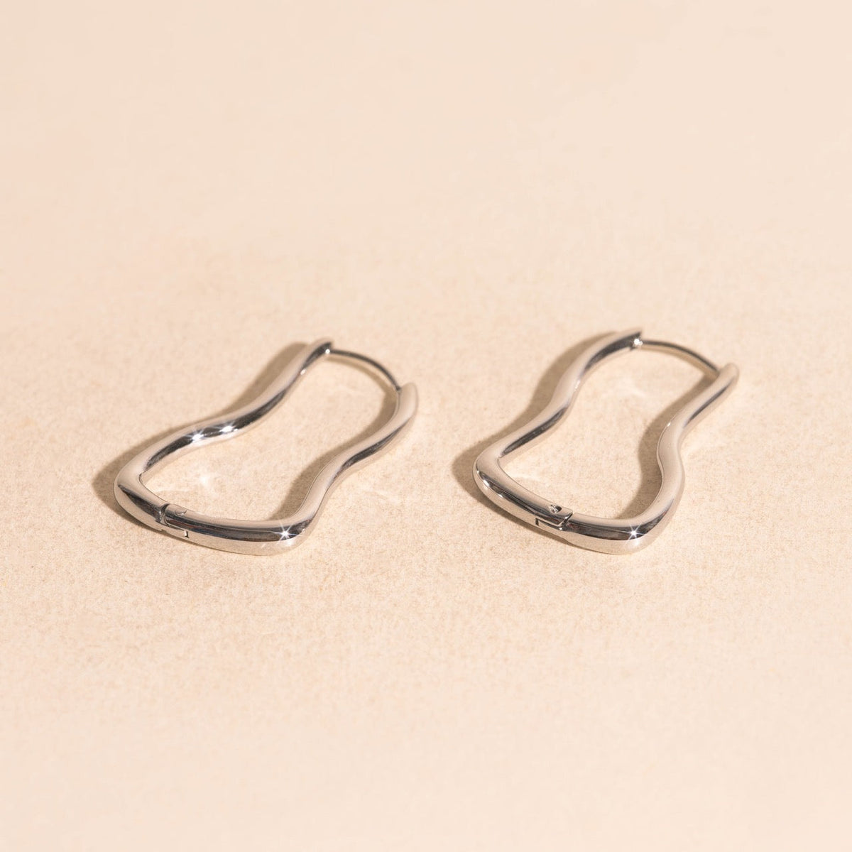 Cosmic Wave Rounded Huggie Hoop Earrings