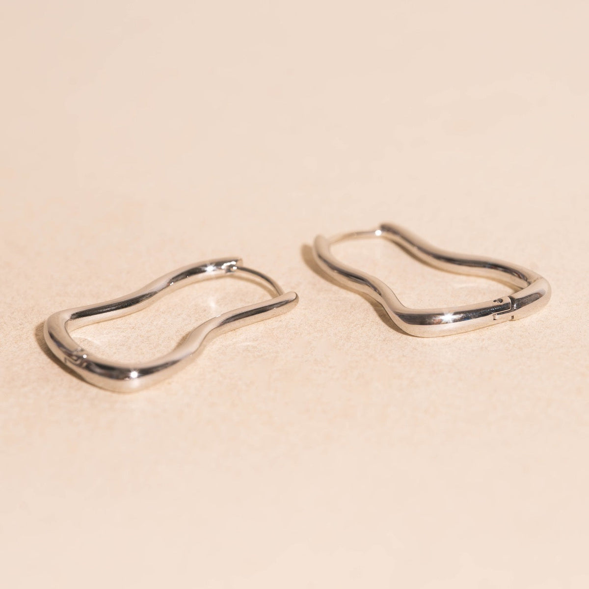 Cosmic Wave Rounded Huggie Hoop Earrings